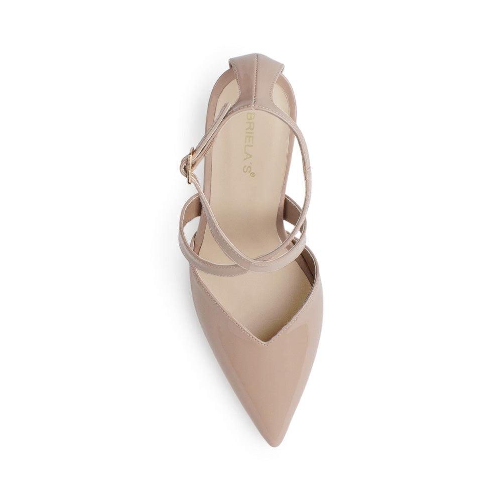 Vista superior de zapatilla nude para mujer tipo stiletto con punta fina cerrada y correas cruzadas