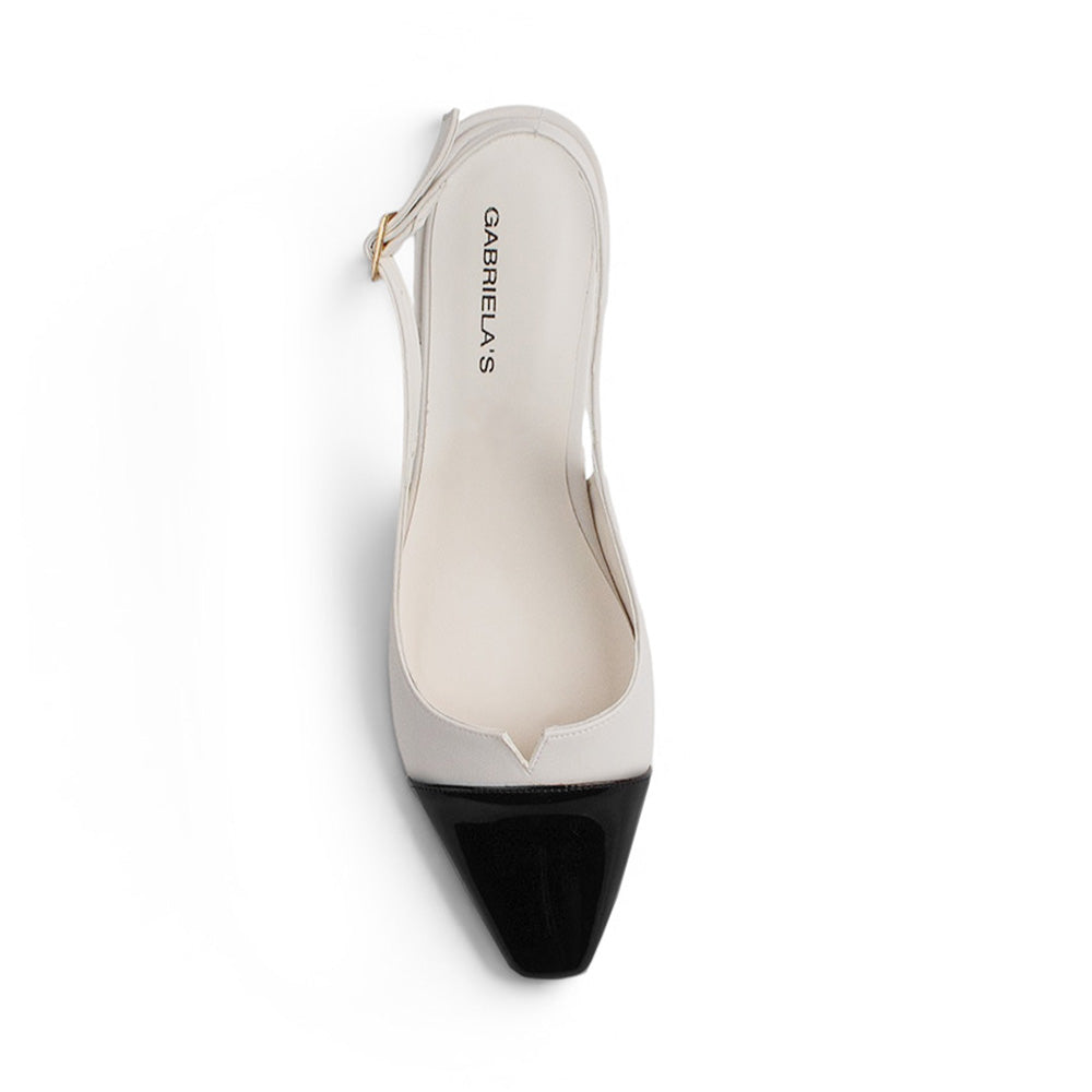 vista superior de zapatillas cómodas para dama beige con punta negra 