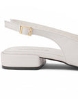 vista trasera de zapatillas para dama color beige con tacón bajo 3cm y talón descubierto 