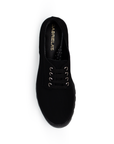 Vista superior de mocasín negro para mujer con punta redonda y ajuste de agujetas