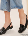 Flats negros de charol con antifaz en el empeine y pulsera ajustable para dama 