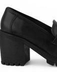 Vista trasera del tacón grueso tamaño medio 8cm en el mocasín negro con punta redonda y plataforma chunky  para dama  