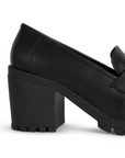 Vista trasera del tacón grueso tamaño medio 8cm en el mocasín negro con punta redonda y plataforma chunky  para dama  