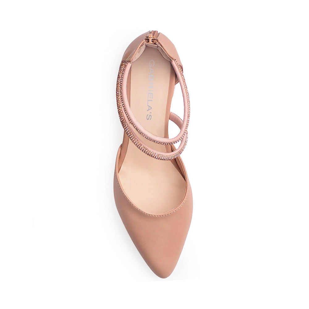 Vista superior de zapatilla para mujer con punta fina cerrada y tiras de pedrería en color nude