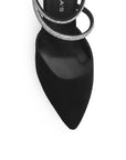 Vista de material buck en zapatilla negra para mujer de punta fina cerrada y tacón bajo ancho de 6cm con pedrería