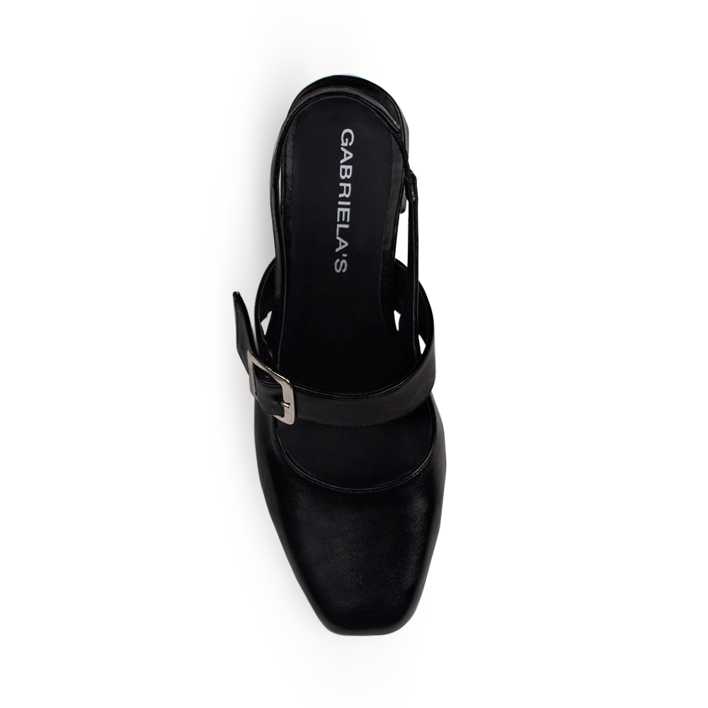 Vista superior de zapatilla negra destalonada para mujer con punta cerrada y taco ancho de 5cm