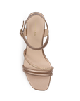 Vista superior de zapatilla oro rosado para mujer con tiras asimétricas con brillos y pulsera ajustable