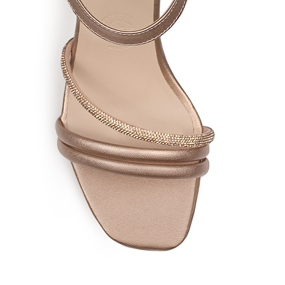 Vista de material cabra sintético en zapatilla oro rosado para mujer con tacón 7cm y tiras brillosas 