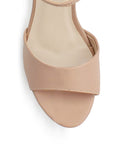 Vista de material cabra sintético en zapatilla nude para mujer con pulsera ajustable y tacón alto ancho de 12cm