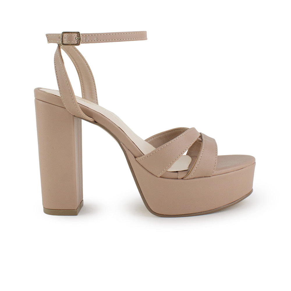 Vista lateral de zapatilla nude para mujer con tacón bloque alto de 12cm y pulsera ajustable al tobillo