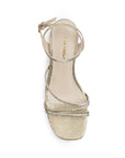 Vista superior en la zapatilla dorada de fiesta con tiras cruzadas, pulsera ajustable al tobillo y tacón medio 7cm para dama 