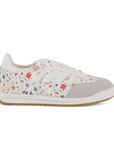 Vista lateral del tenis beige para dama con suela baja 2 cm de diseño floral y punta gris