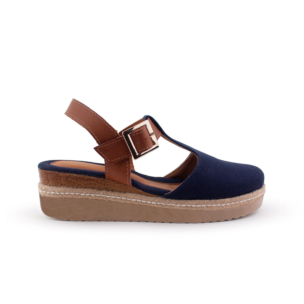 vista lateral de plataformas azules para dama con pulsera café y plataforma baja 5cm
