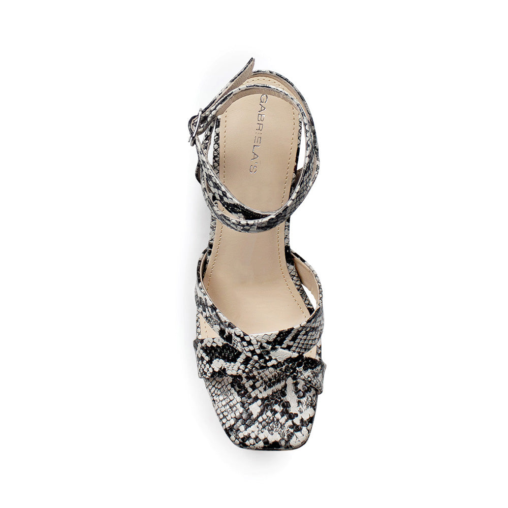 vista superior de zapatillas beige para dama con tiras cruzadas al frente y correa ajustable con tacón alto 11cm para dama 