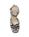 vista superior de zapatillas beige para dama con tiras cruzadas al frente y correa ajustable con tacón alto 11cm para dama 