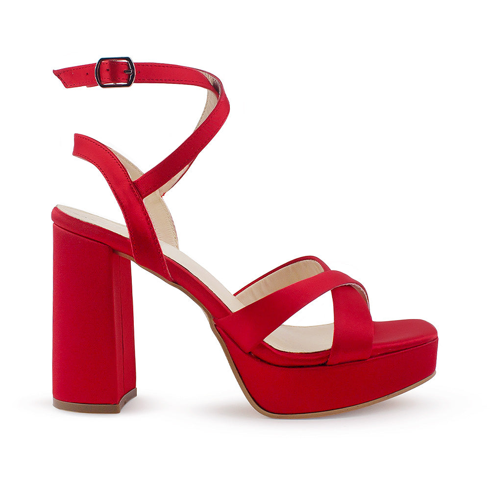 vista lateral de zapatillas rojas para dama con plataforma tiras cruzadas y correa ajustable con tacón alto 11cm