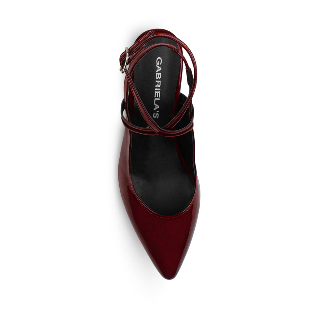 Vista superior de zapatilla vino para mujer  con punta fina y tiras cruzadas 