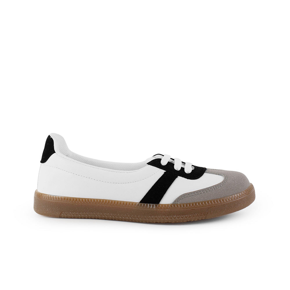 Vista lateral del tenis blanco con negro casual con agujetas y suela baja 2cm para dama 