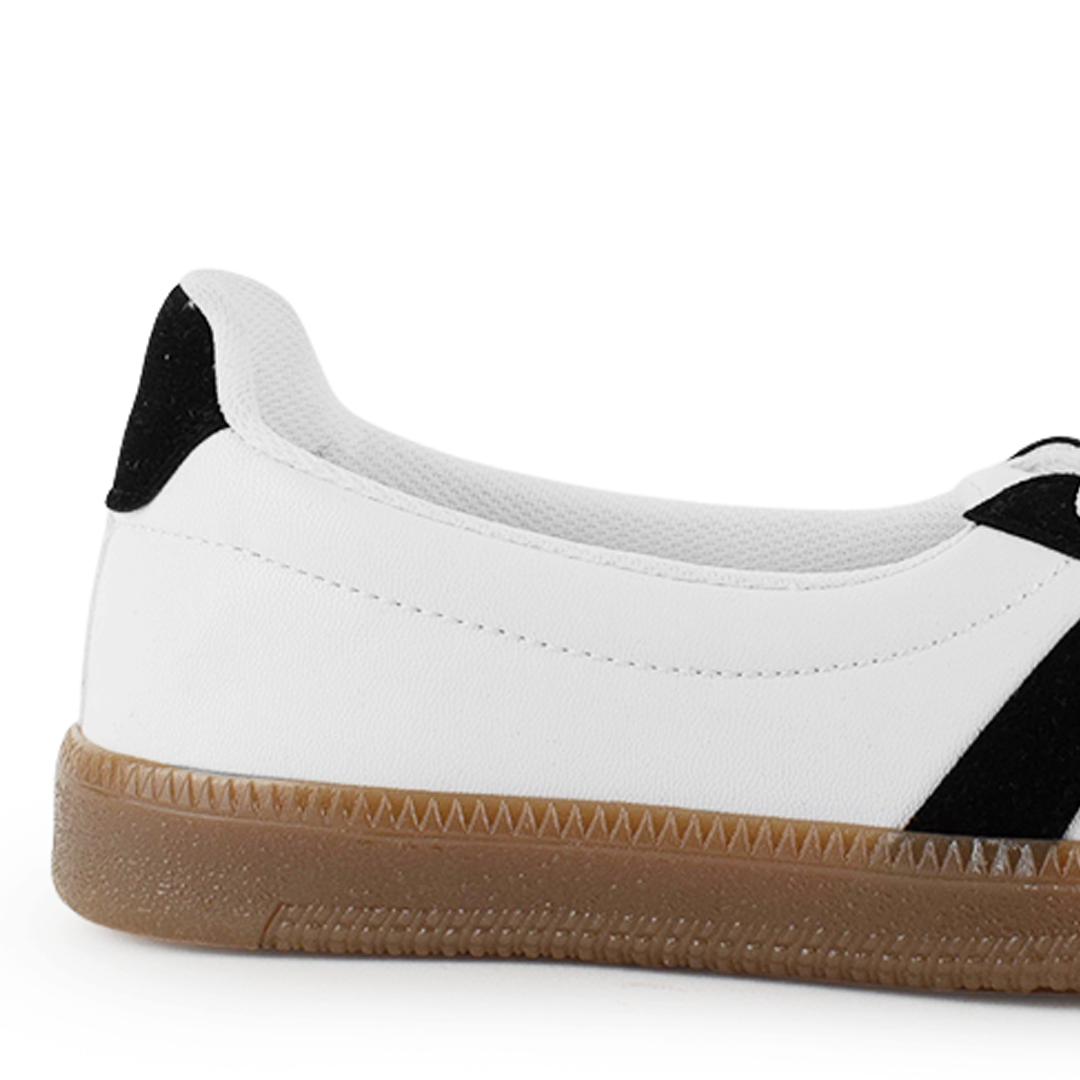 Vista trasera de la suela baja 2cm en tenis blanco con negro casual para dama  