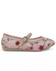 Vista lateral de flats tipo balerinas nude transparentes para de piso con bordado floral 