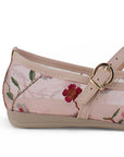 Vista trasera en flats tipo balerinas de piso nude transparentes con bordado floral para dama 