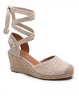 vista diagonal de alpargatas para dama color beige con plataforma 8cm