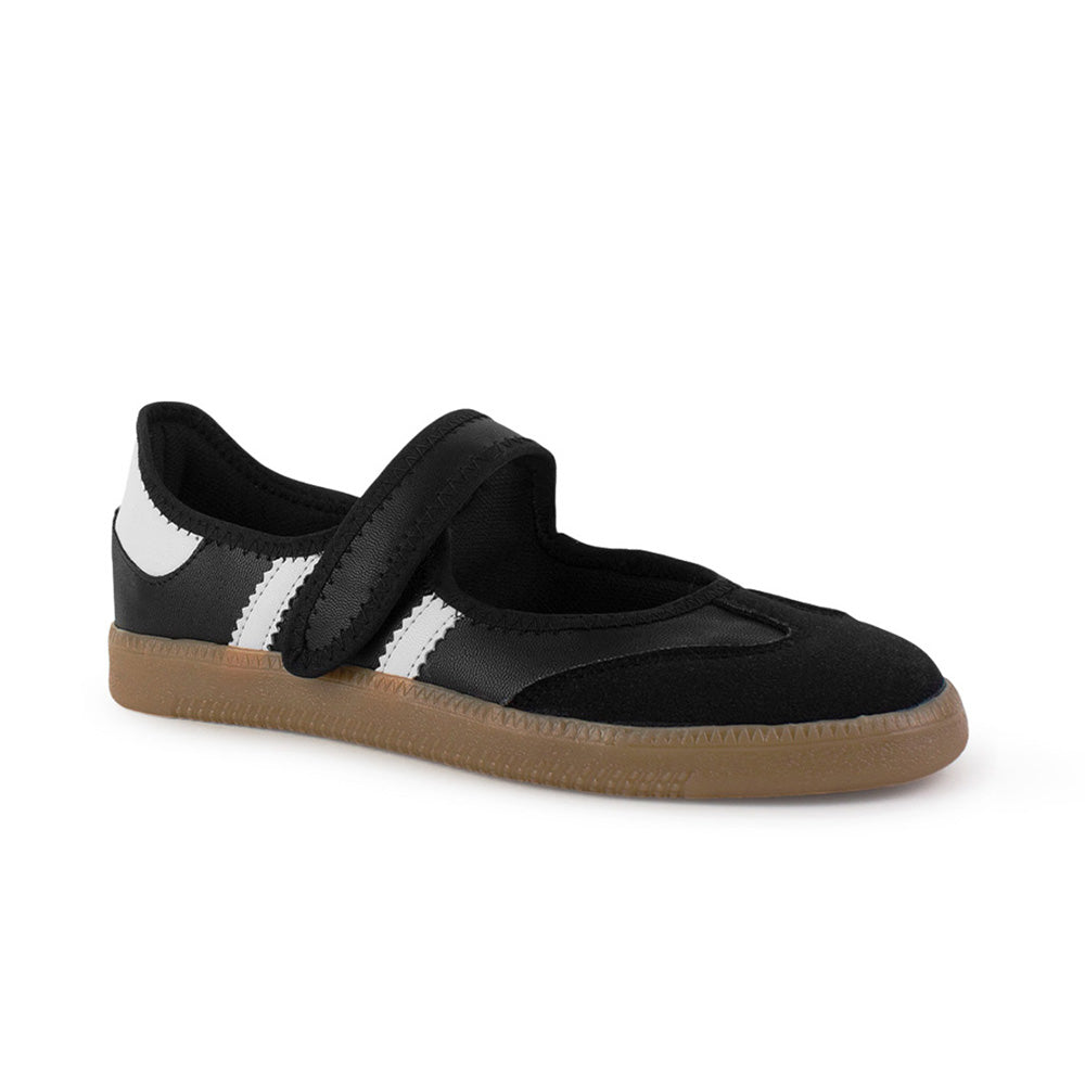 Vista diagonal de tenis negro con blanco para dama con suela baja y pulsera ajustable en el empeine 