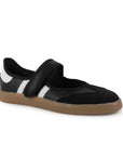 Vista diagonal de tenis negro con blanco para dama con suela baja y pulsera ajustable en el empeine 