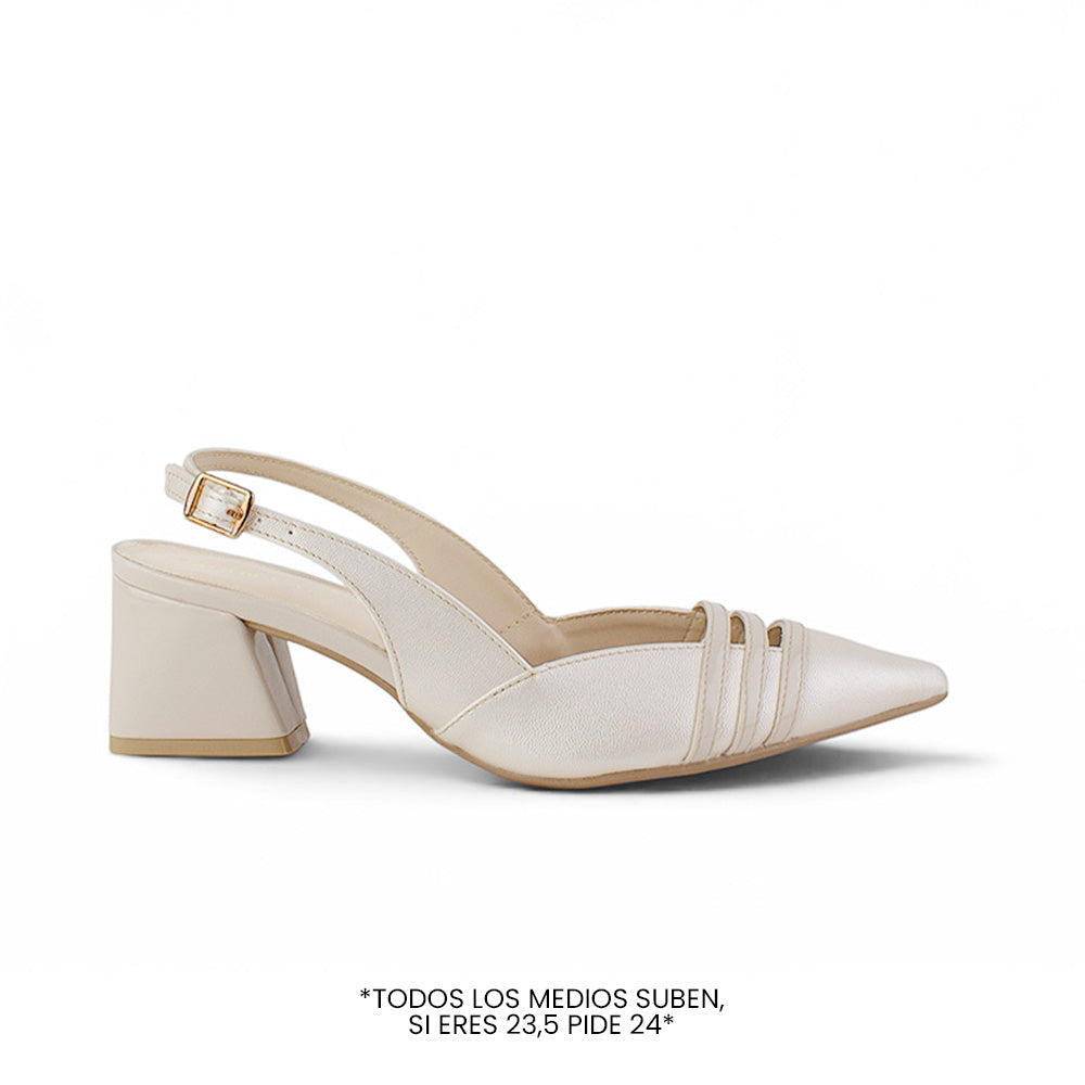 Vista lateral de zapatilla beige destalonada con punta fina y tacón bajo 6cm para dama