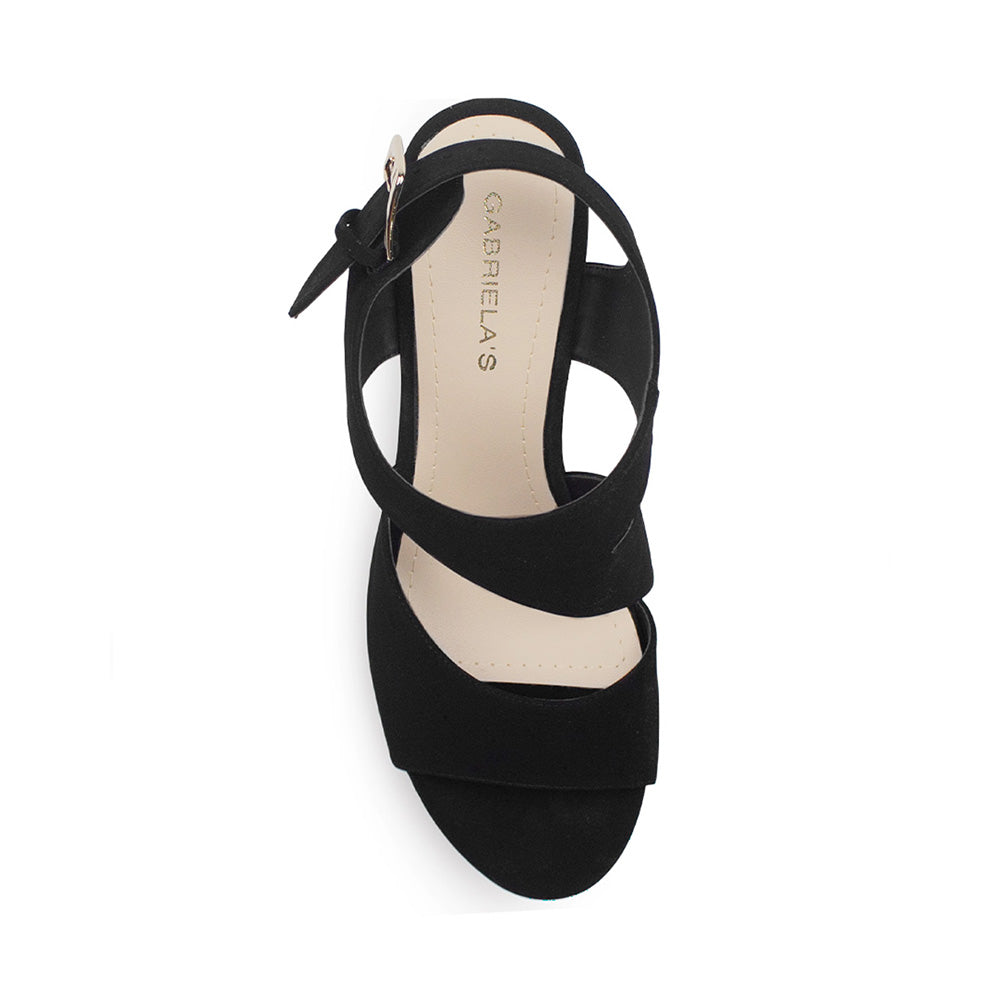 Vista superior de zapatilla negra para mujer con diseño descubierto y hebilla cuadrada en pulsera ajustable