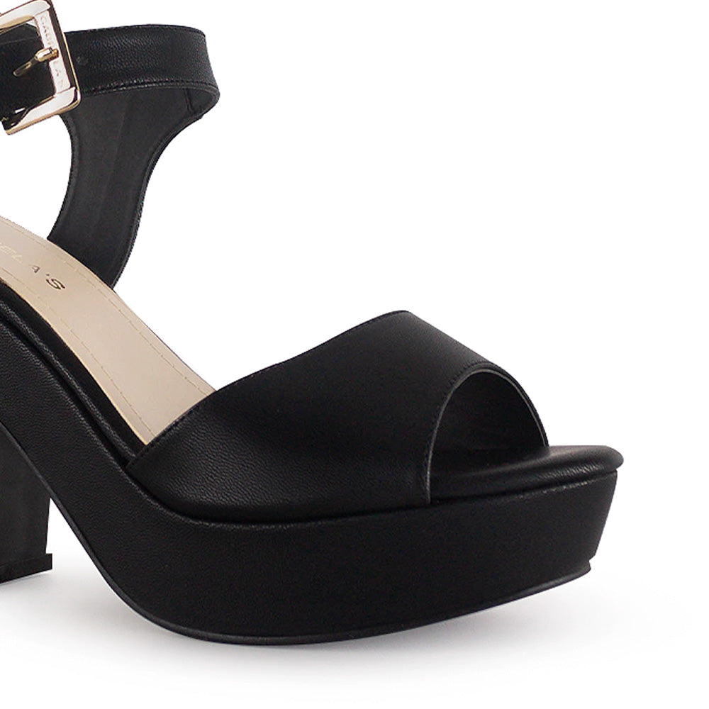Vista de material cabra sintético en zapatilla para mujer con pulsera ajustable y tacón medio de 10cm color negro 