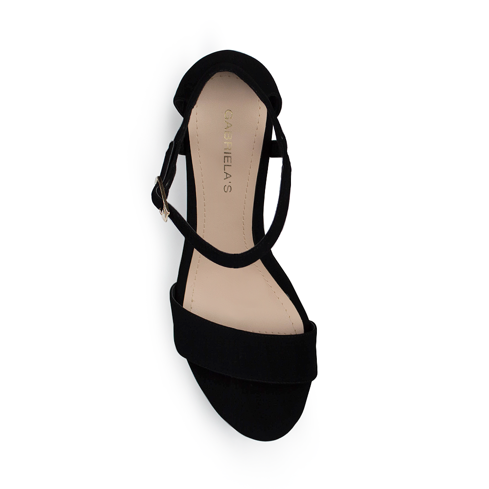 Vista superior de zapatilla para mujer con pulsera ajustable y de diseño descubierto en color negro