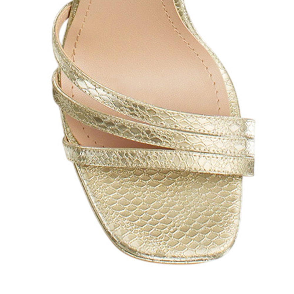 Vista de material sintético en zapatilla oro para mujer con tiras cruzadas y tacón alto de 11cm 