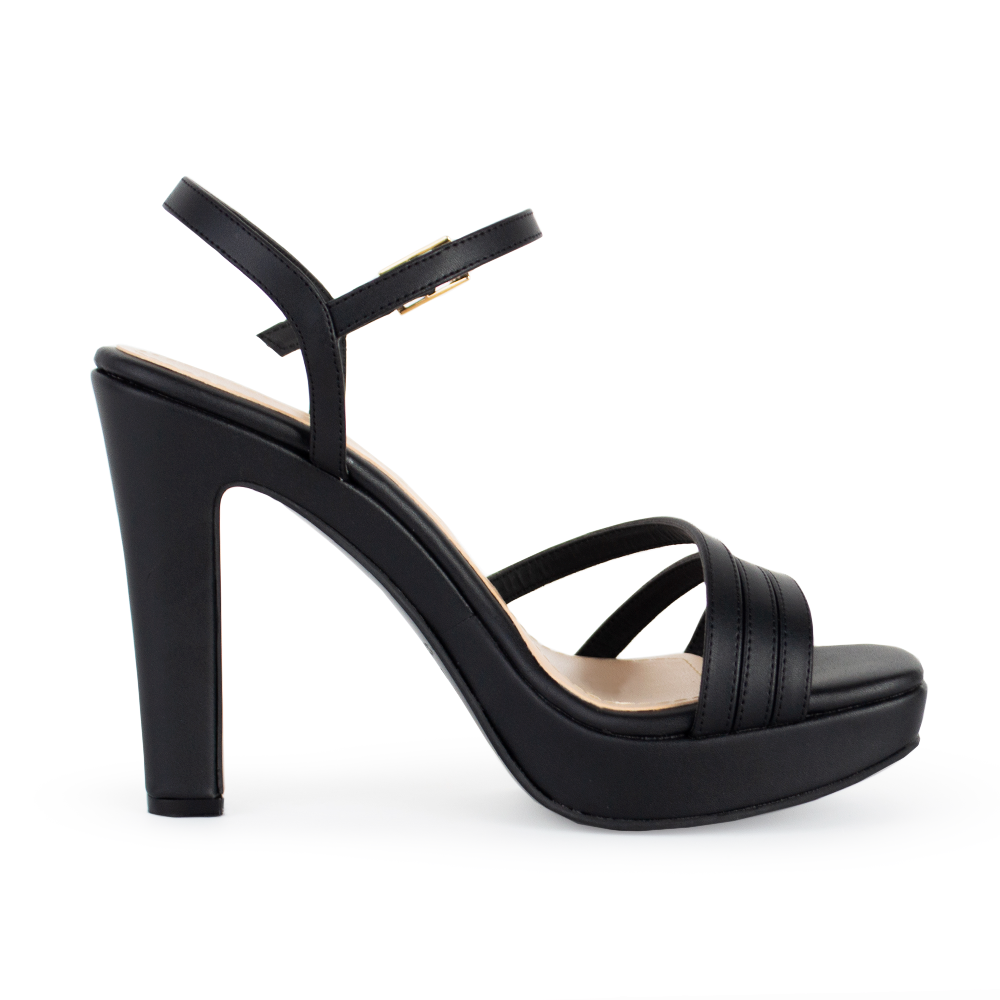 Vista de material cabra sintético en zapatilla negra para mujer con tiras cruzadas y tacón alto de 11cm 