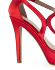 Vista trasera de tacón alto delgado de 12cm en zapatilla para mujer con tiras cruzadas y diseño descubierto en color rojo