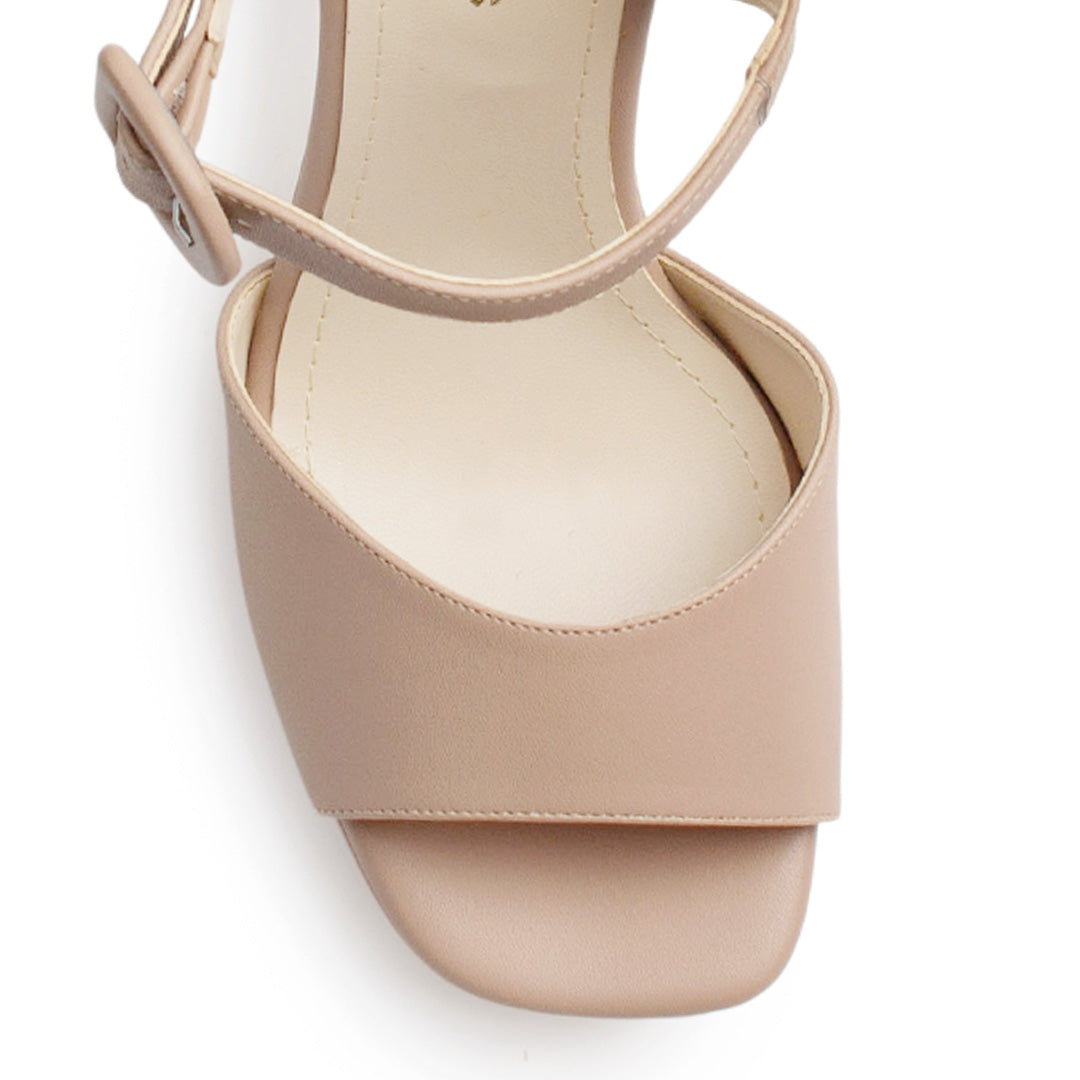 Vista de material cabra sintético en zapatilla nude para mujer con pulsera al tobillo hebilla forrada y tacón alto de 11cm