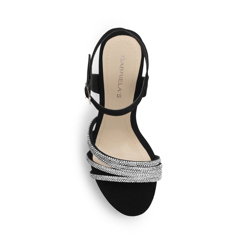 Vista superior de zapatilla negra para mujer con tiras de pedrería pulsera ajustable al tobillo y tacón de 13cm