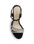 Vista superior de zapatilla negra para mujer con tiras de pedrería pulsera ajustable al tobillo y tacón de 13cm