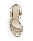 Vista superior de zapatilla dorada para mujer con tiras de pedrería pulsera ajustable al tobillo y tacón de 13cm