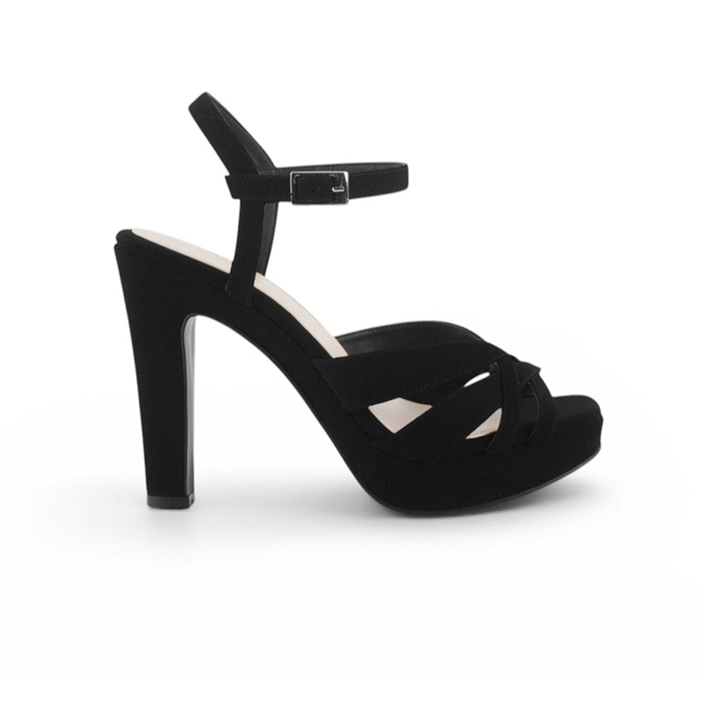 Vista lateral de zapatilla negra de diseño descubierto para mujer con tacón alto de 12cm y pulsera ajustable 