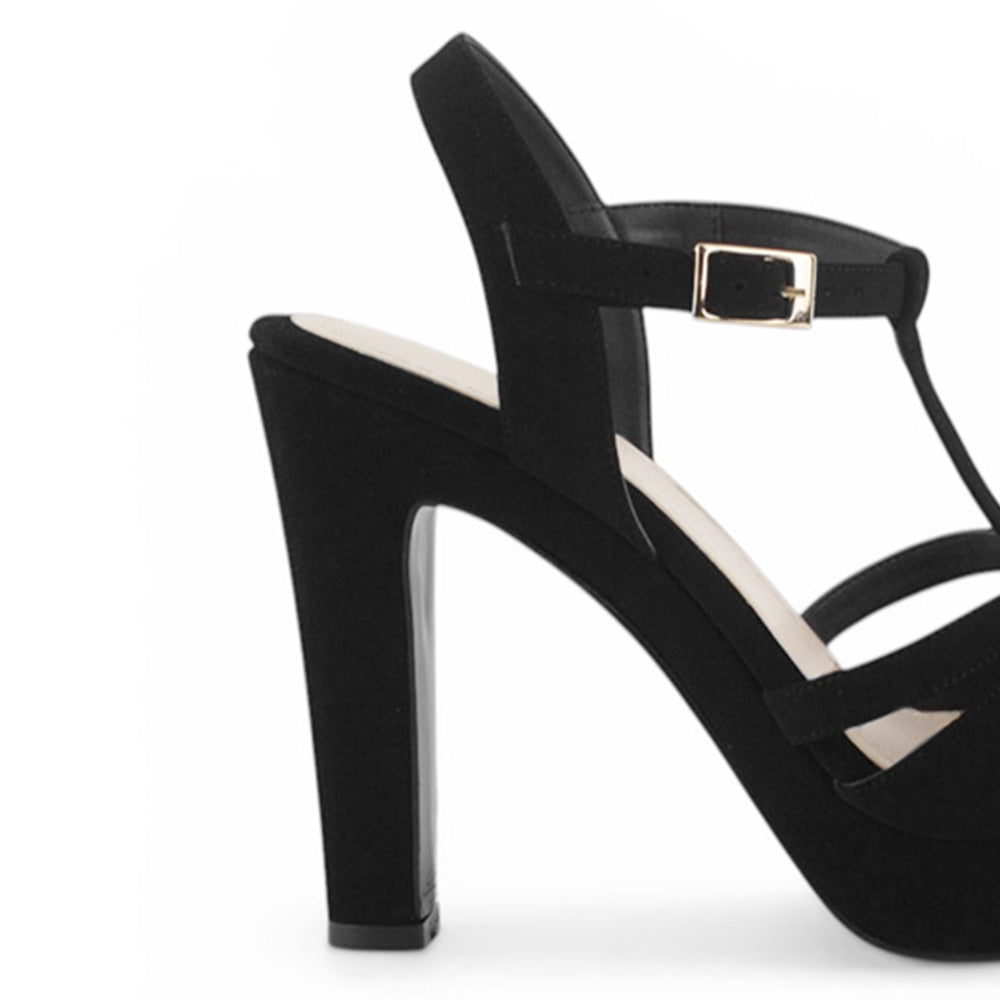 Vista trasera de tacón alto de 12cm en zapatilla para mujer con pulsera ajustable al tobillo en color negro