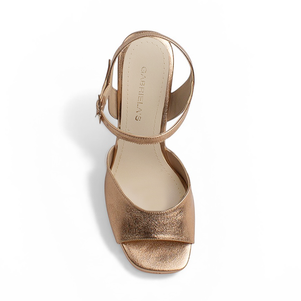 Vista superior de zapatilla para dama oro rosa con punta abierta pulsera ajustable al tobillo y plataforma tacón alto 12cm 