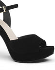 Detalle del material buck en zapatilla negra con plataforma para dama tacón alto 12cm  pulsera ajustable al tobillo 
