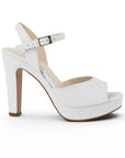 Vista lateral de zapatilla blanca para dama con plataforma, pulsera ajustable al tobillo, punta abierta y tacón alto 12cm 