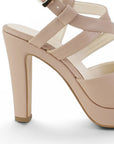 Vista trasera de tacón alto delgado de 12cm en zapatilla nude para mujer con pulsera ajustable 