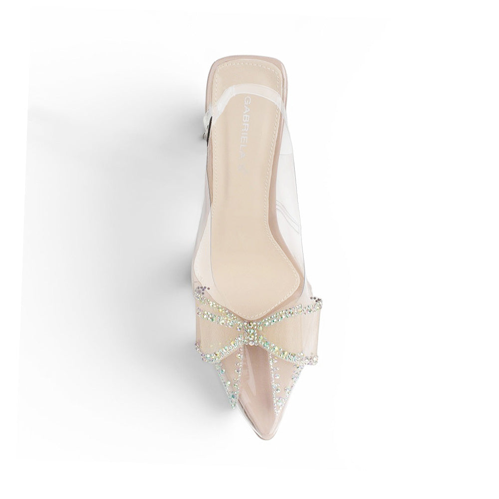 Vista superior de zapatilla nude transparente para mujer con punta fina cerrada y moño de pedrería 