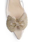 Vista de material sintético en zapatilla beige transparente destalonada para mujer con pedrería en punta fina tipo stiletto y tacón delgado de 9cm 