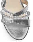 Vista de material sintético en zapatilla plateada de plataforma para mujer con tiras de pedrería tacón ancho de 10cm y pulsera ajustable 