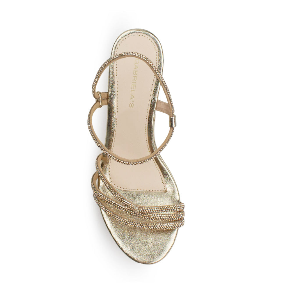 vista superior de zapatillas oro para dama tiras de pedrería y plataforma con tacón medio 10 cm