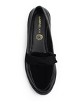 Vista superior de mocasín negro de meter para mujer con moño decorativo en empeine 
